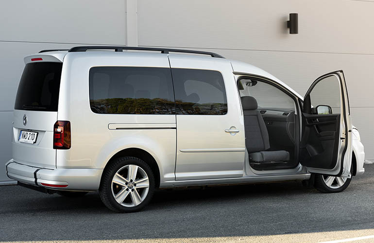 Volkswagen Caddy with the front passenger door open and the Turnout seat rotated outward