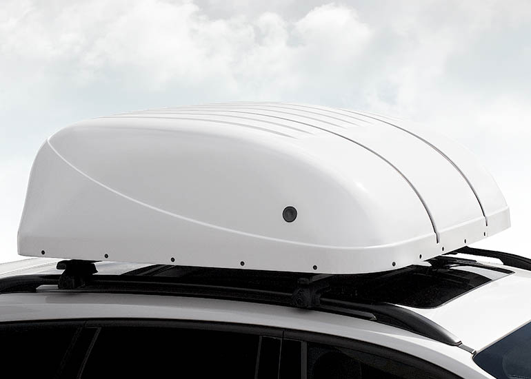 Weatherproof Chair Topper roof box mounted on a car roof rack