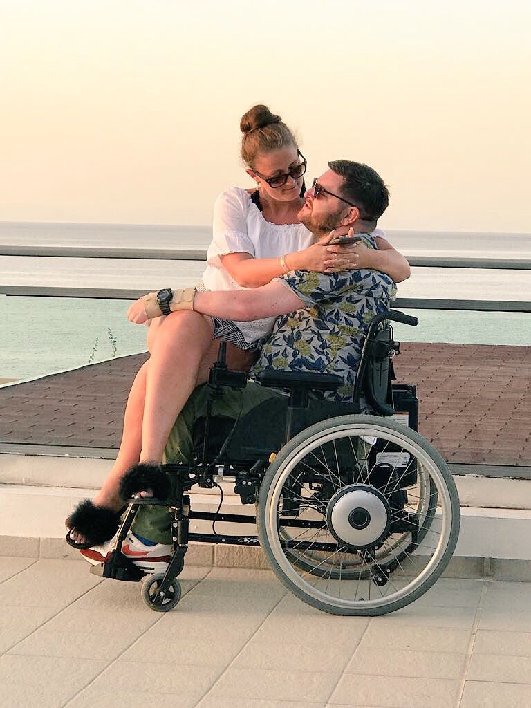 Gavin Wilson and his wife Alice together beside the sea