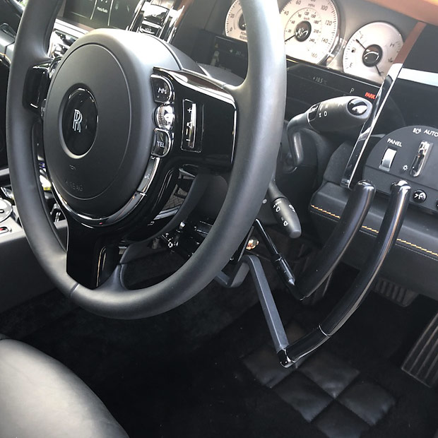 Feeny & Johnson twin-lever pull-pull hand controls fitted beneath a steering wheel
