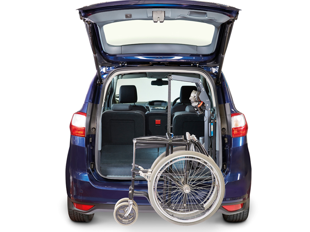 Autochair Smart Lifter LM boot hoist lifting a folding wheelchair