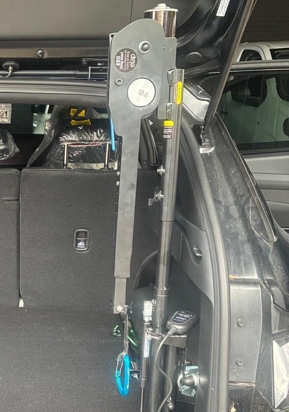 Elap E50 50kg boot hoist folded down inside a vehicle boot