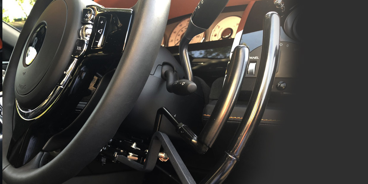 Close view of Feeny & Johnson pull-pull hand control levers installed in a Rolls-Royce
