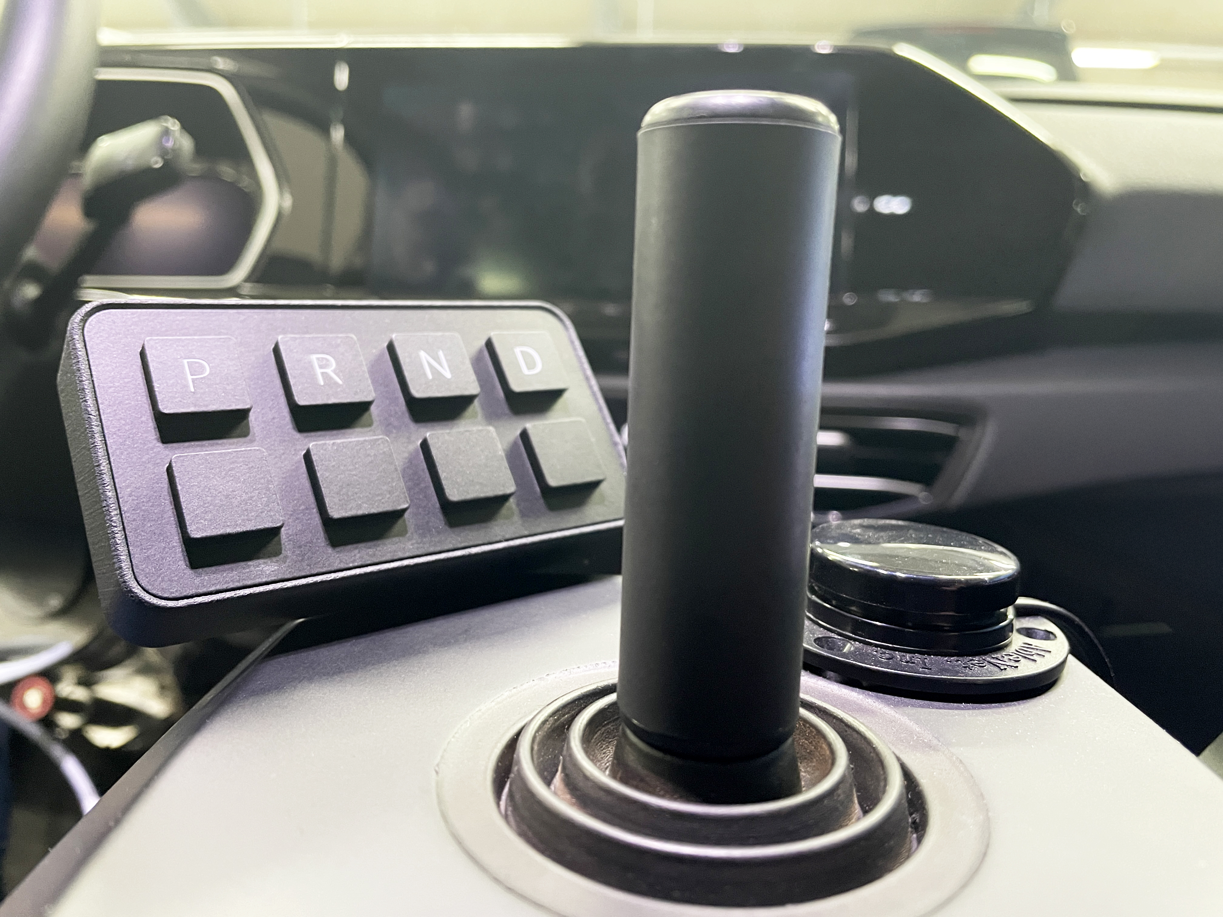 Electric Gear Selector push-button switch pad fitted in a vehicle
